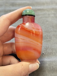 A collection of nine Chinese agate snuff bottles, 20th C.