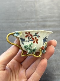 Two Chinese gilt-decorated famille rose cups and saucers with floral design, Qianlong