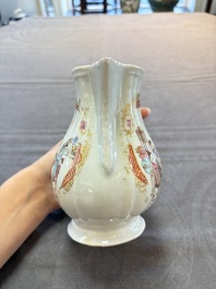 A Chinese famille rose 'mandarin subject' jug and cover, Qianlong