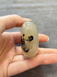 A collection of nine Chinese agate snuff bottles, 20th C.