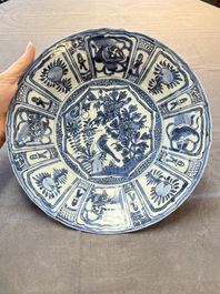 Three Chinese blue and white 'kraak' dishes with a bird and flowers, Wanli