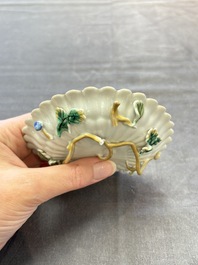 Two Chinese gilt-decorated famille rose cups and saucers with floral design, Qianlong