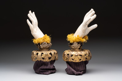 A pair of plaster hands with gilt-bronze cuffs and fabric adornments, Italy, 19th C.