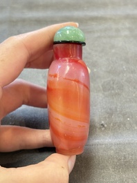 A collection of nine Chinese agate snuff bottles, 20th C.