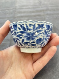 A set of six Chinese blue and white cups and saucers with floral design, Kangxi