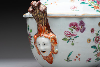 A Chinese famille rose 'mascarons' tureen and cover on stand with floral design, Qianlong