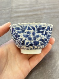 A set of six Chinese blue and white cups and saucers with floral design, Kangxi