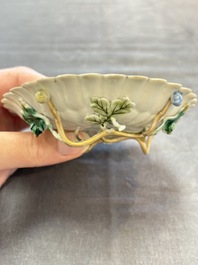 Two Chinese gilt-decorated famille rose cups and saucers with floral design, Qianlong