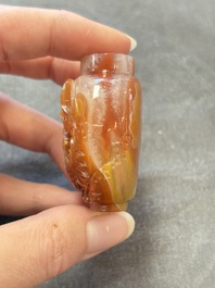 A collection of nine Chinese agate snuff bottles, 20th C.