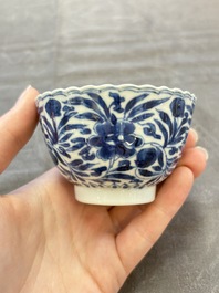 A set of six Chinese blue and white cups and saucers with floral design, Kangxi
