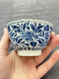 A set of six Chinese blue and white cups and saucers with floral design, Kangxi