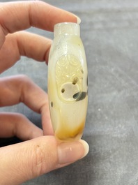 A collection of nine Chinese agate snuff bottles, 20th C.