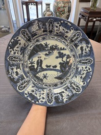 Three Japanese blue and white flower-shaped plates and a 'fisherman' dish, Edo, 17/18th C.