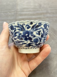 A set of six Chinese blue and white cups and saucers with floral design, Kangxi