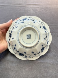 Three Japanese blue and white flower-shaped plates and a 'fisherman' dish, Edo, 17/18th C.