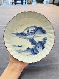 A Chinese blue and white ko-sometsuke 'riverscape' plate for the Japanese market, Chenghua mark, late Ming