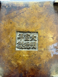 A Chinese archaistic bronze square censer with two handles, Xuande mark, Qing