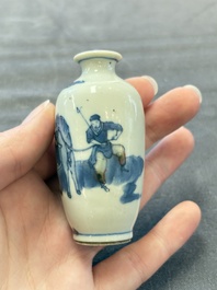 A Chinese peachbloom-crackle-glazed 'meiping' snuff bottle and a figural blue, white and copper-red snuff bottle, Yongzheng mark, 19th C.
