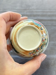 A pair of Chinese famille rose 'European subject' cups and saucers, Qianlong