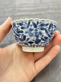 A set of six Chinese blue and white cups and saucers with floral design, Kangxi