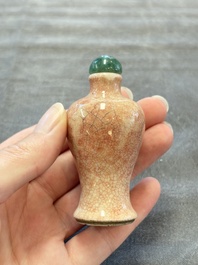A Chinese peachbloom-crackle-glazed 'meiping' snuff bottle and a figural blue, white and copper-red snuff bottle, Yongzheng mark, 19th C.