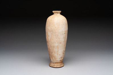 A Chinese Cizhou cream-glazed high-shouldered vase, Song/Jin