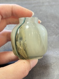 A collection of nine Chinese agate snuff bottles, 20th C.