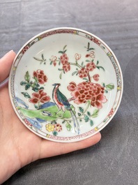 A set of six Chinese famille rose 'peacock' cups and saucers, Yongzheng
