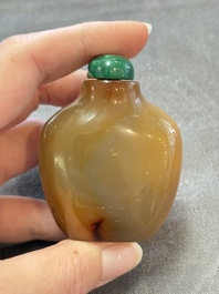 A collection of nine Chinese agate snuff bottles, 20th C.