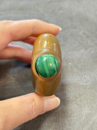 A collection of nine Chinese agate snuff bottles, 20th C.