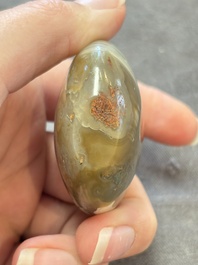 A collection of nine Chinese agate snuff bottles, 20th C.