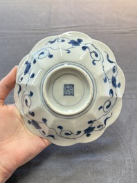 Three Japanese blue and white flower-shaped plates and a 'fisherman' dish, Edo, 17/18th C.