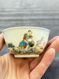 A pair of Chinese famille rose 'European subject' cups and saucers, Qianlong
