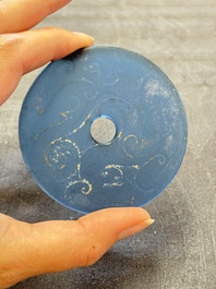 Four Chinese blue glass 'bi' discs, Han/Song