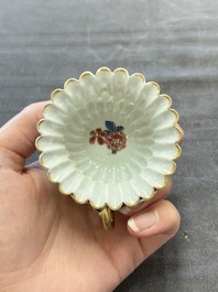 Two Chinese gilt-decorated famille rose cups and saucers with floral design, Qianlong
