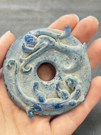 Four Chinese blue glass 'bi' discs, Han/Song