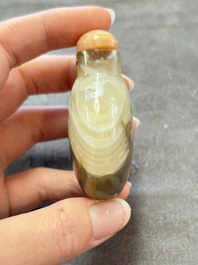 A collection of nine Chinese agate snuff bottles, 20th C.