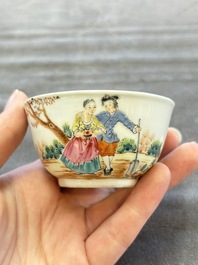 A pair of Chinese famille rose 'European subject' cups and saucers, Qianlong