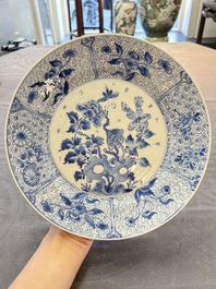 Four Chinese blue and white plates with floral design, Kangxi