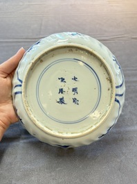 A Chinese blue and white ko-sometsuke 'riverscape' plate for the Japanese market, Chenghua mark, late Ming