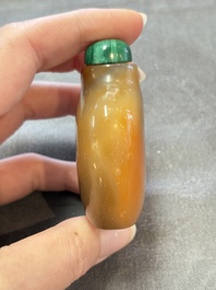 A collection of nine Chinese agate snuff bottles, 20th C.