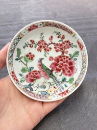 A set of six Chinese famille rose 'peacock' cups and saucers, Yongzheng
