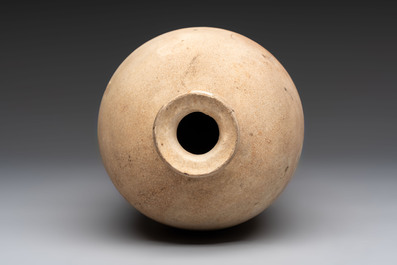 A Chinese Cizhou cream-glazed high-shouldered vase, Song/Jin