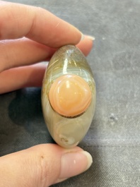 A collection of nine Chinese agate snuff bottles, 20th C.
