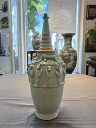 A Chinese qingbai-glazed covered urn applied with zodiac figures, Song
