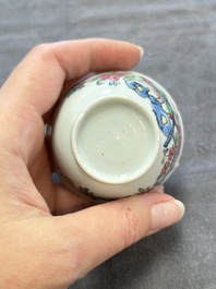A set of six Chinese famille rose 'peacock' cups and saucers, Yongzheng
