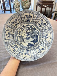 Three Chinese blue and white 'kraak' dishes with a bird and flowers, Wanli