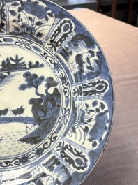Three Japanese blue and white flower-shaped plates and a 'fisherman' dish, Edo, 17/18th C.