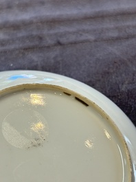 A pair of Chinese famille rose 'European subject' cups and saucers, Qianlong