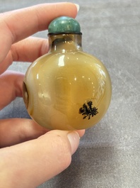 A collection of nine Chinese agate snuff bottles, 20th C.